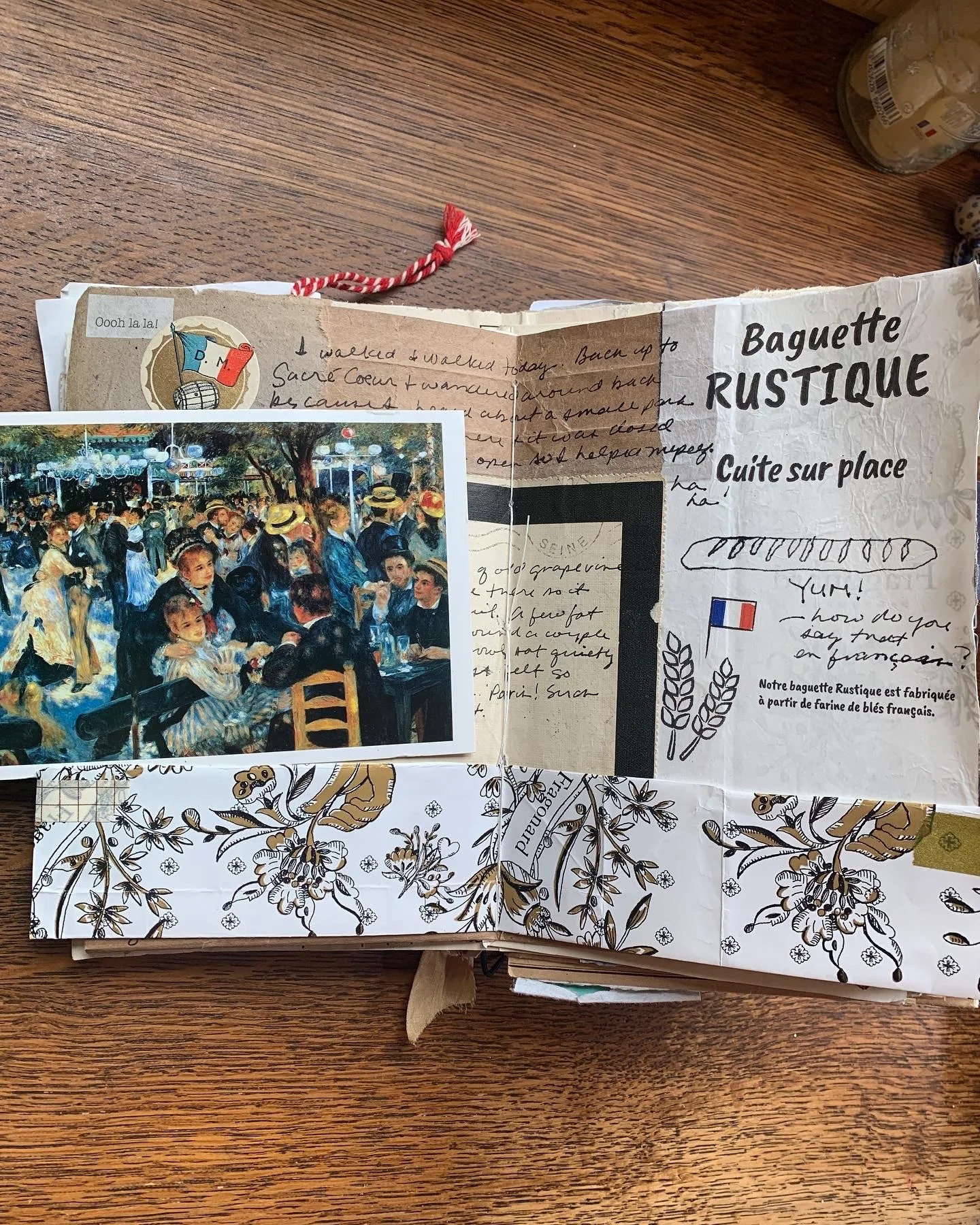 Vintage travel journal collage page with Paris ephemera, layered papers, handwriting, and travel memories.