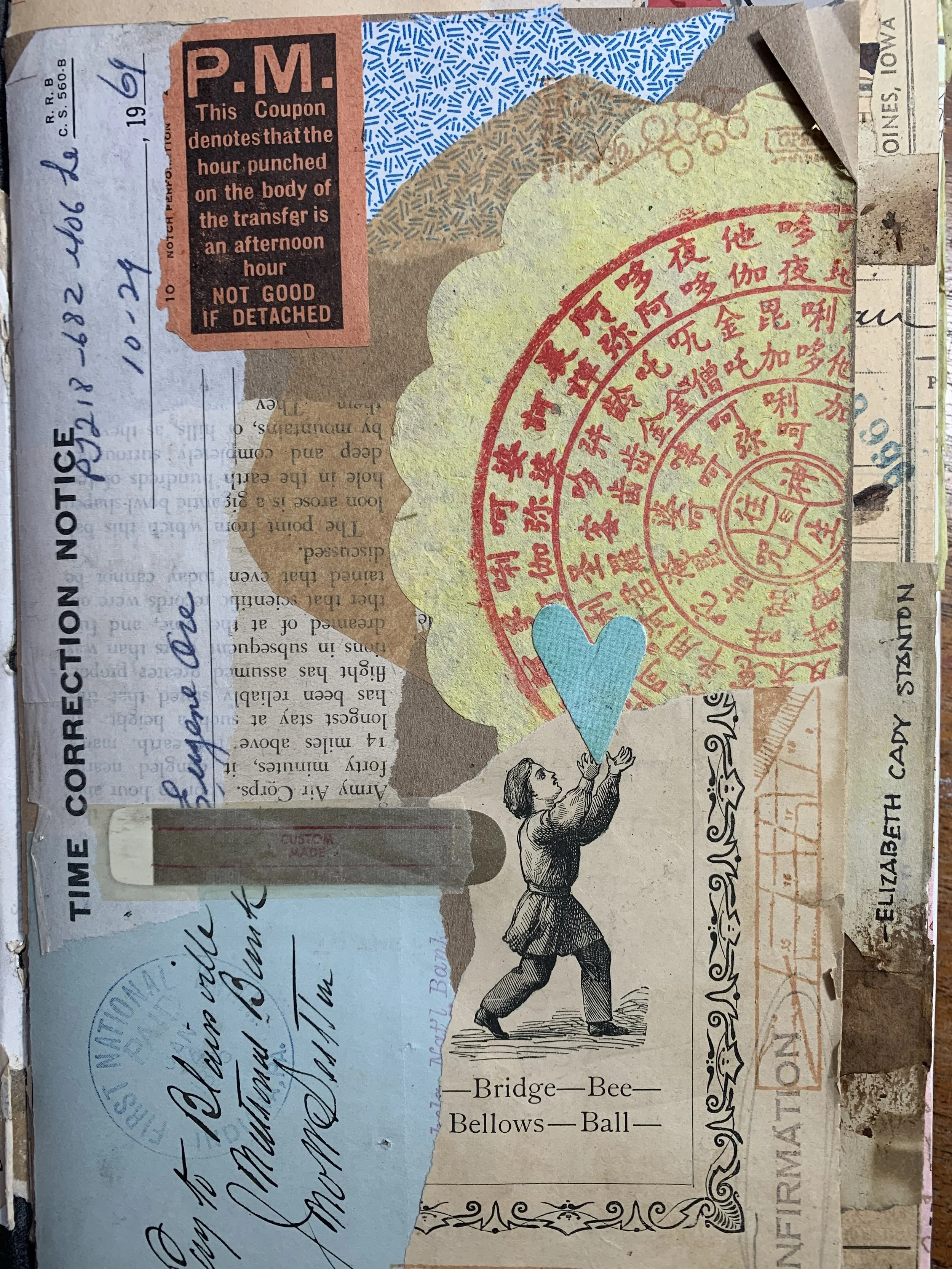 Close-up detail of a handmade art journal collage page with layered papers and textured ephemera.