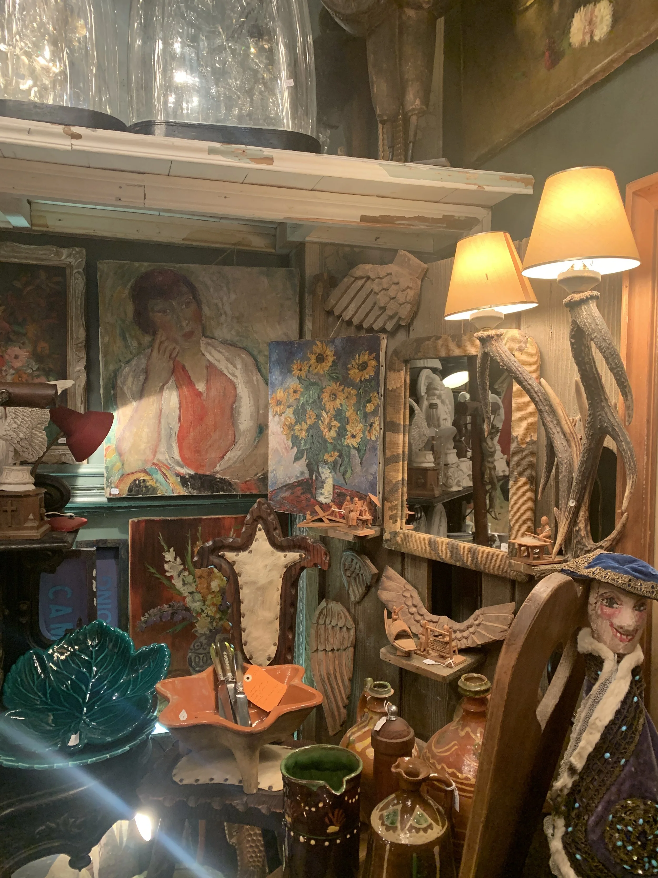 Inside of L'Objet Qui Parle, antique shop near Montmartre in Paris.