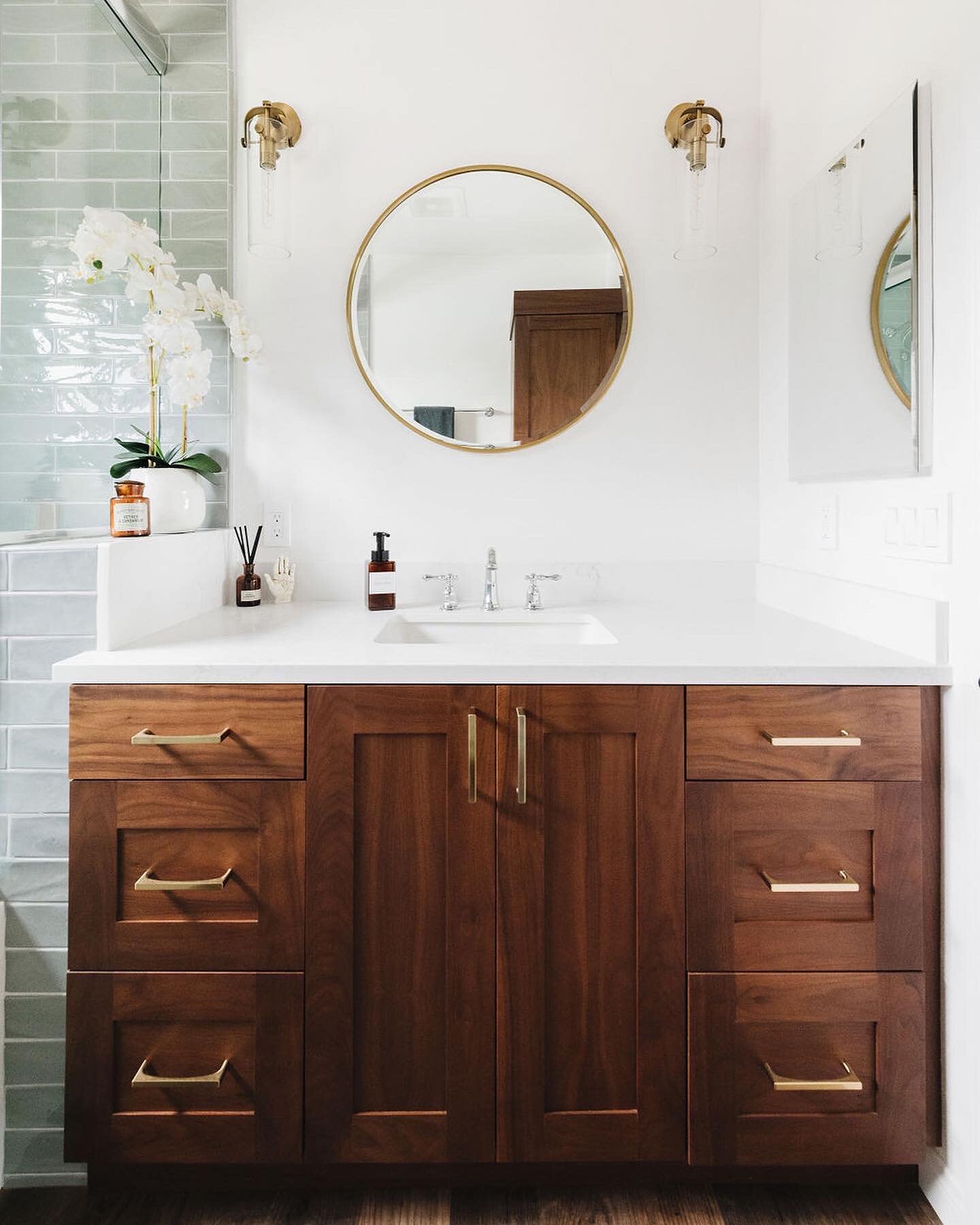 Black Walnut is always a show stopper! 🤩 We created this beautiful vanity with our Simeon Door Style in the Beechwood finish. 🍯 #honeycabinetry