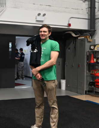 Jay Bulger in a green shirt at the boxing academy