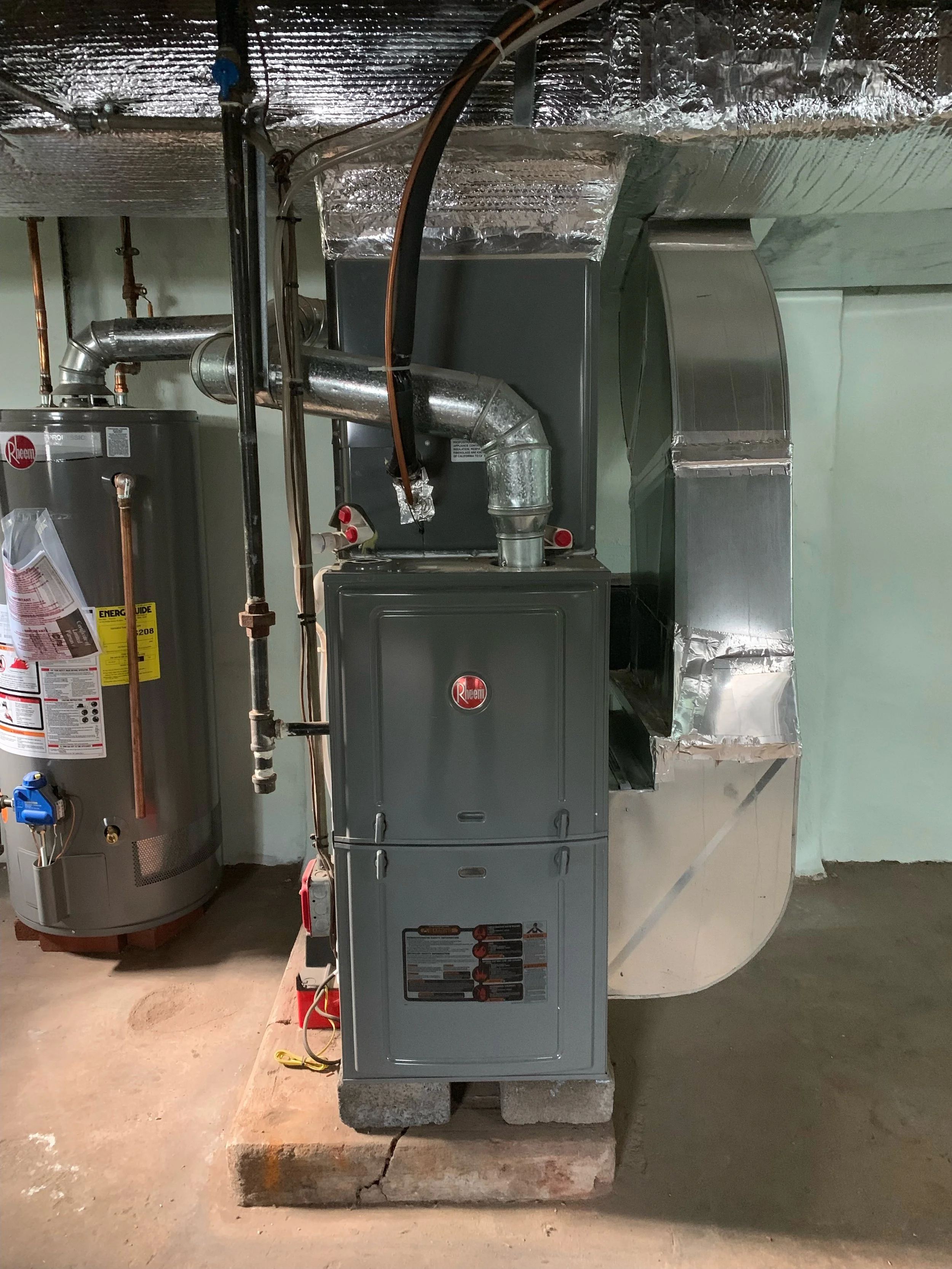 HVAC Condenser Unit on a concrete platform