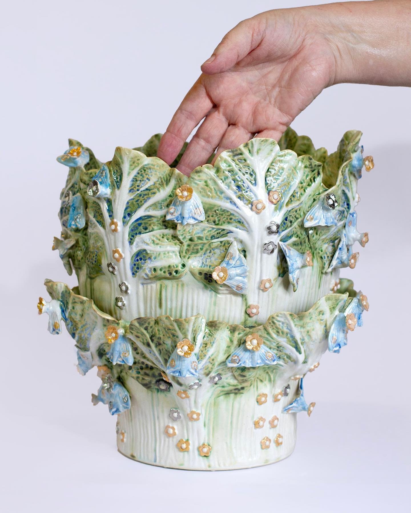 Cabbage vase with moths and flowers.
Stoneware with 22ka gold and platinum lusters