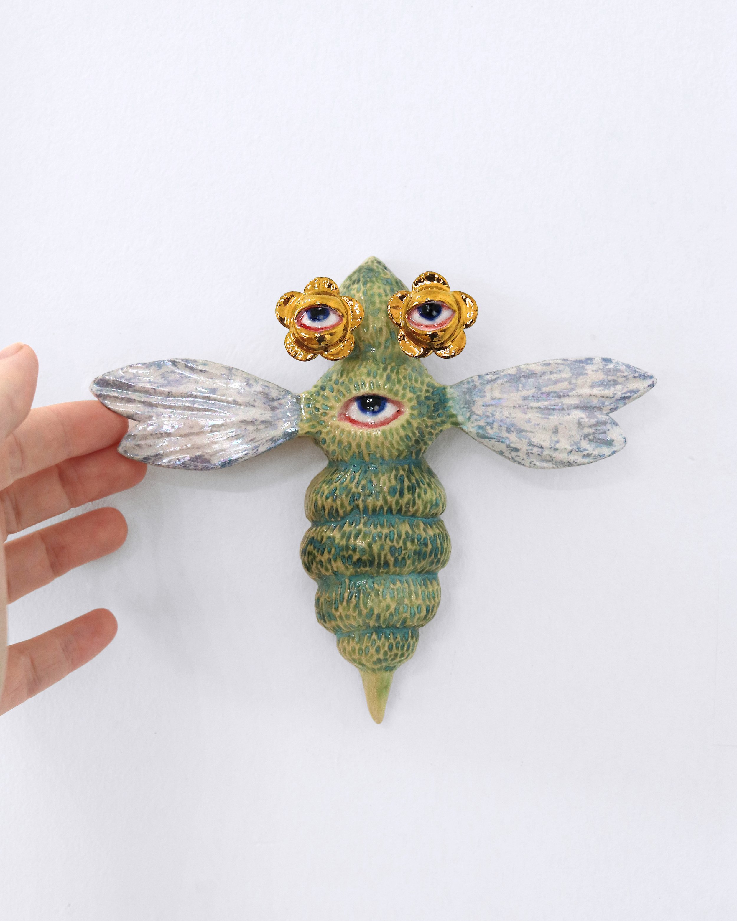 Guardian Bee Green - Hand.jpg