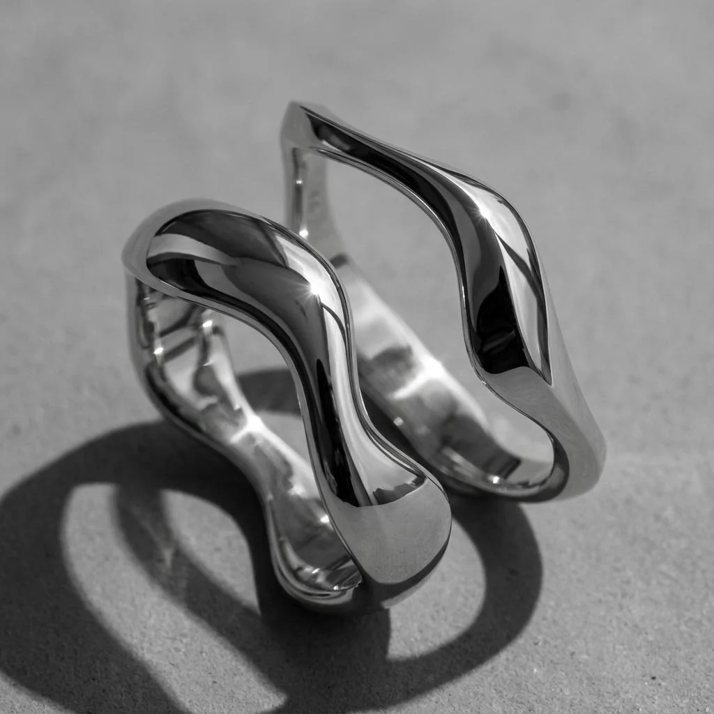 Close-up of someday somewhere wedding rings