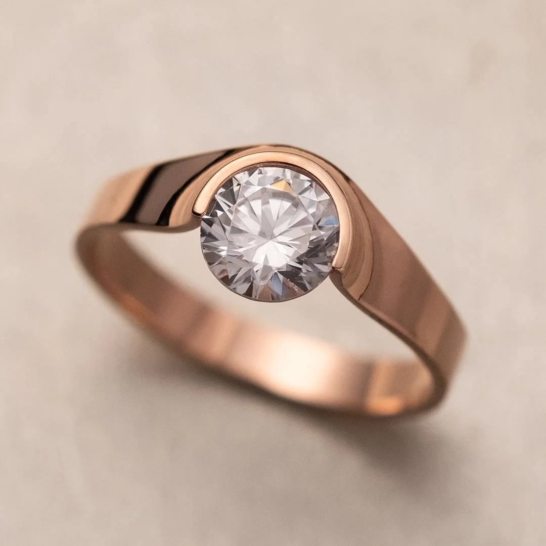 Close-up of the Beyond Light 18K rose gold diamond engagement ring