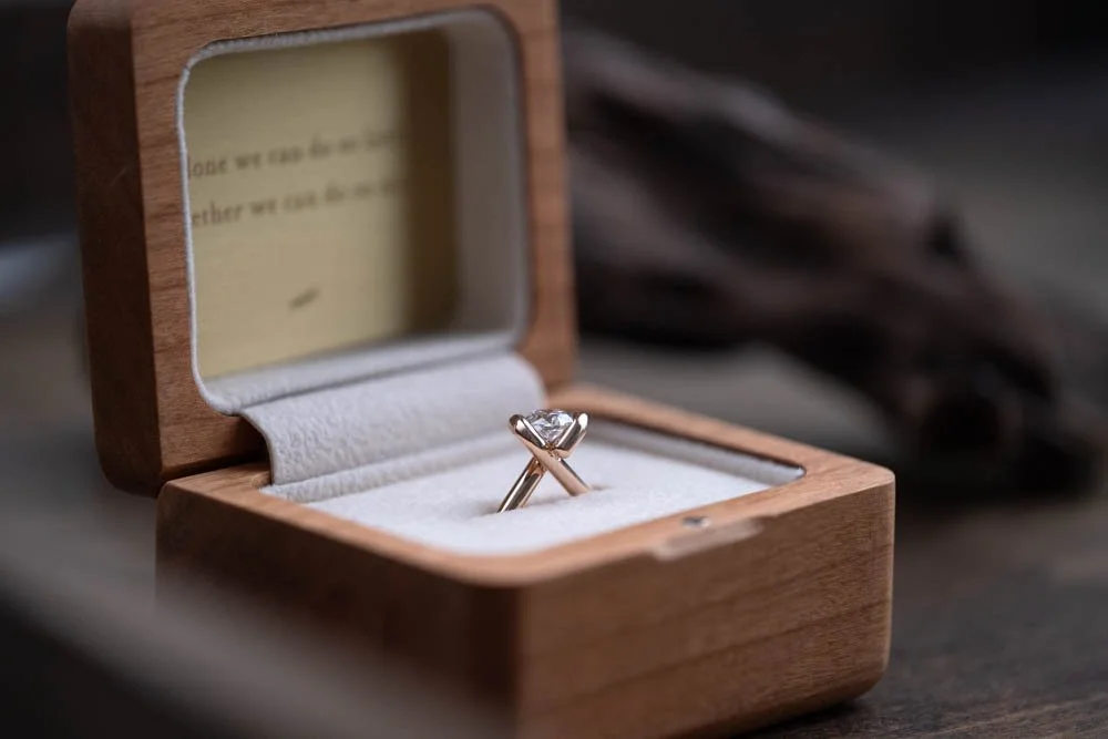 Side view of the diamond ring in ring box