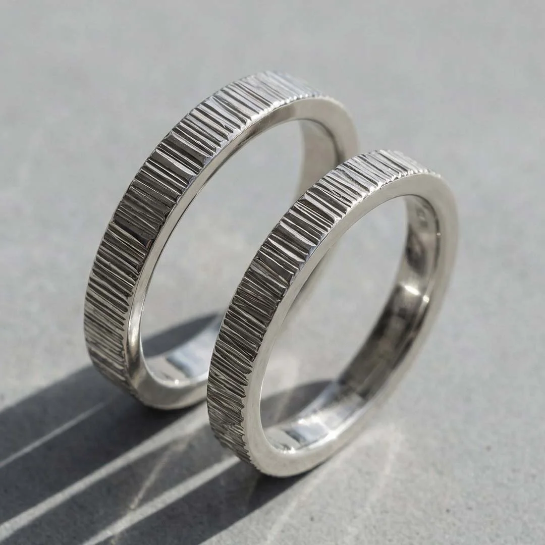 wedding ring workshop hammer wood grain