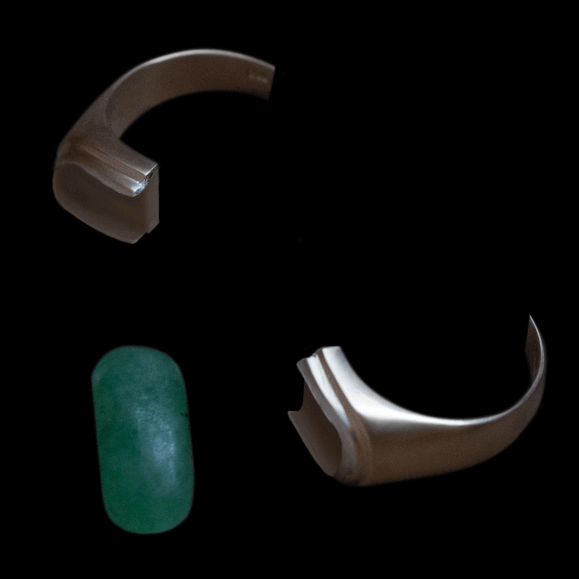 A gif of a separated jade gold ring