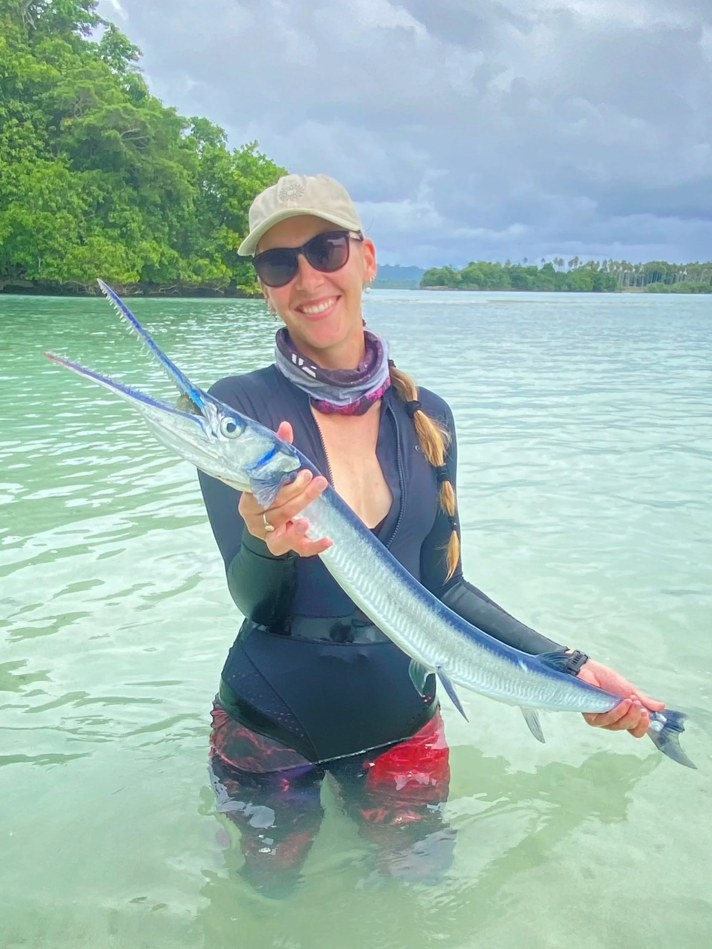 Brooke Mous holding a long tom fishing caught in Aore Island