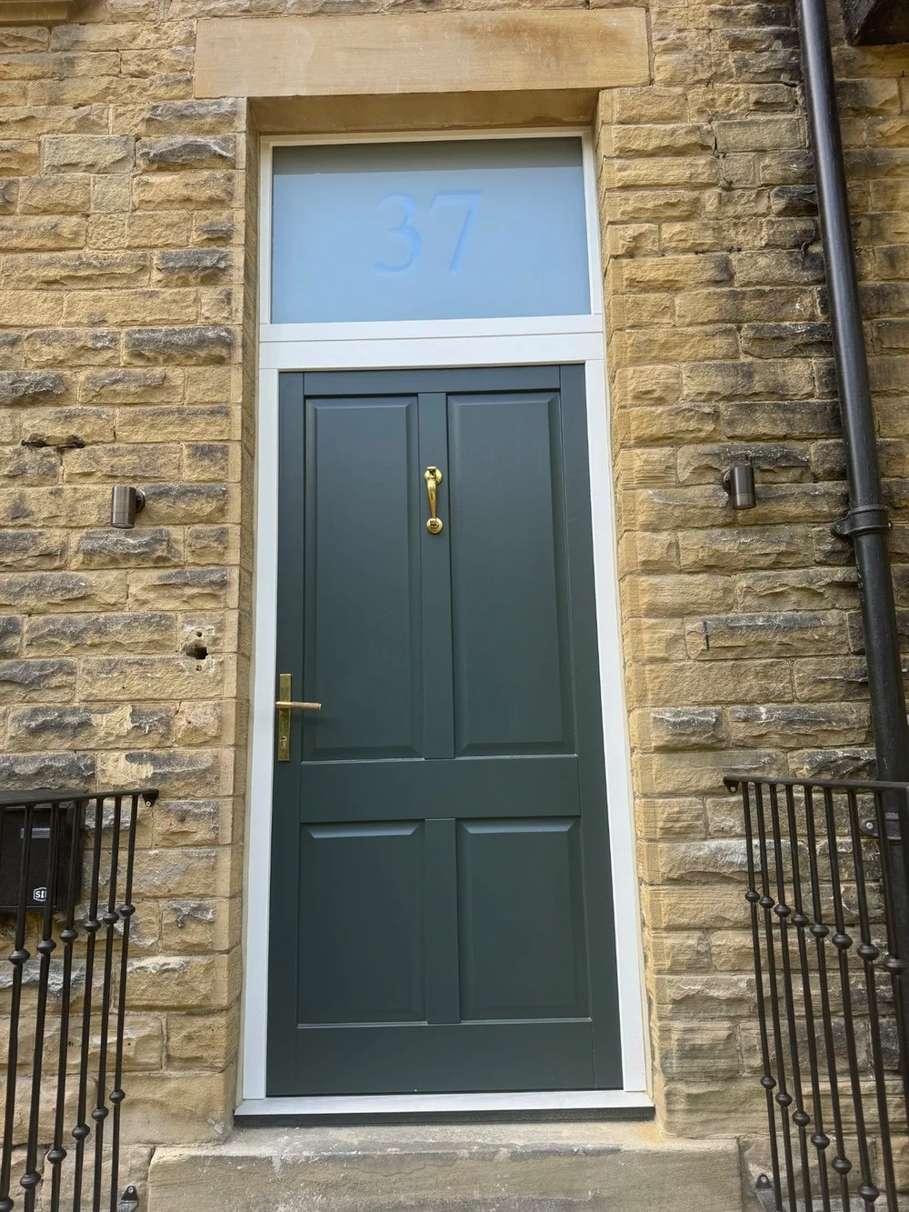 Ready Hung Door Set No. 19: dark green four-panel solid timber door with fanlight, by Leach & Clegg