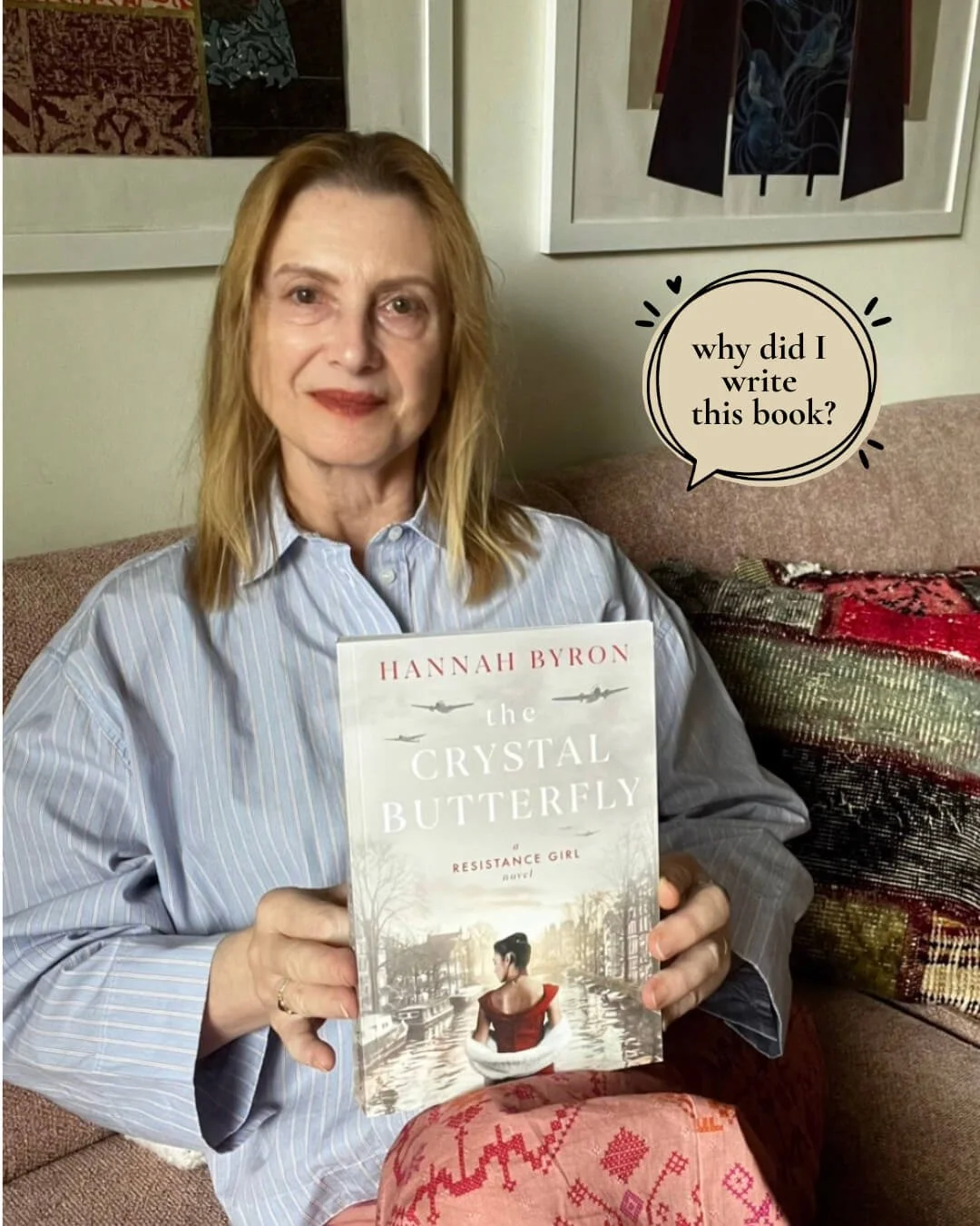 Picture of Hannah Byron a blonde senior woman holding her book The Crystal Butterfly showing the cover with a woman in a red dress overlooking the Amsterdam canals and a sticker caption on the image reads Why did I write this book?