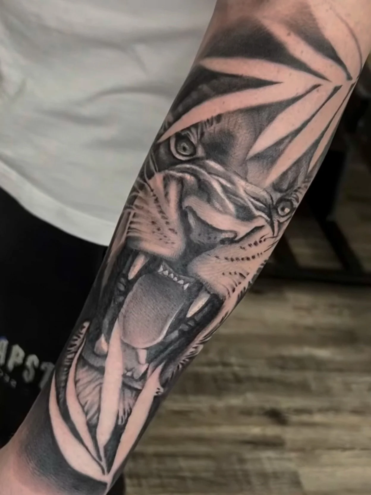 Snarling lion from @ballytattoos 
.
Contact Kyle directly for remaining availability at BTC or to book a session in the new year.
.
#liontattoo #forearmtattoo #brighton #brightontattoo #brightontattooartists #blackandgreytattoo