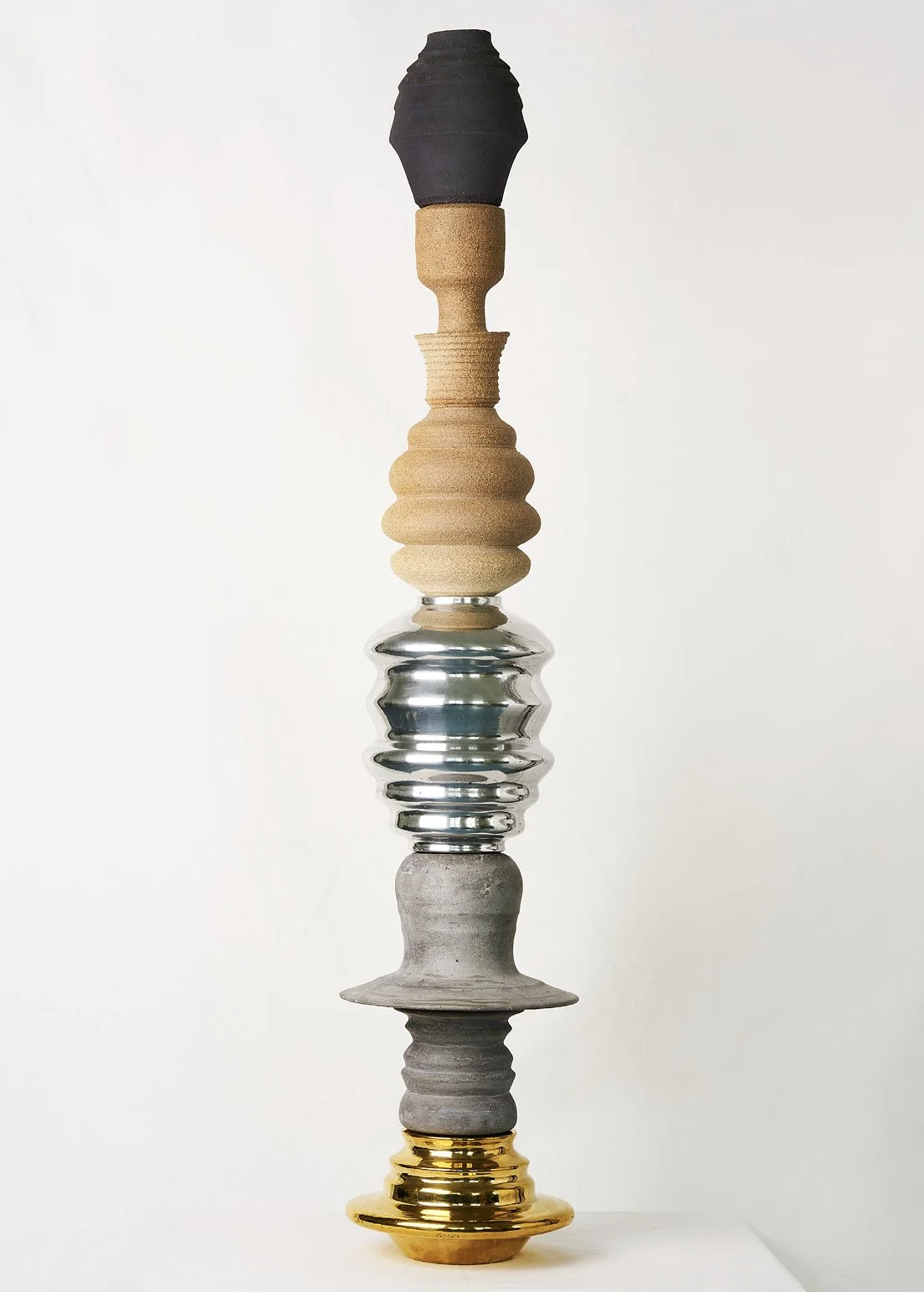 Tótem,_2021,_Bronze,_aluminium_and_ceramics_pieces.112_x_24cm._.jpg