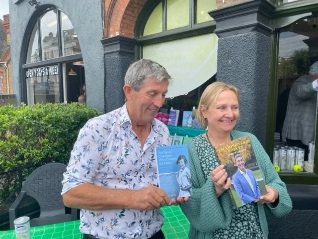   Felice and Andrew Garrett swap books  