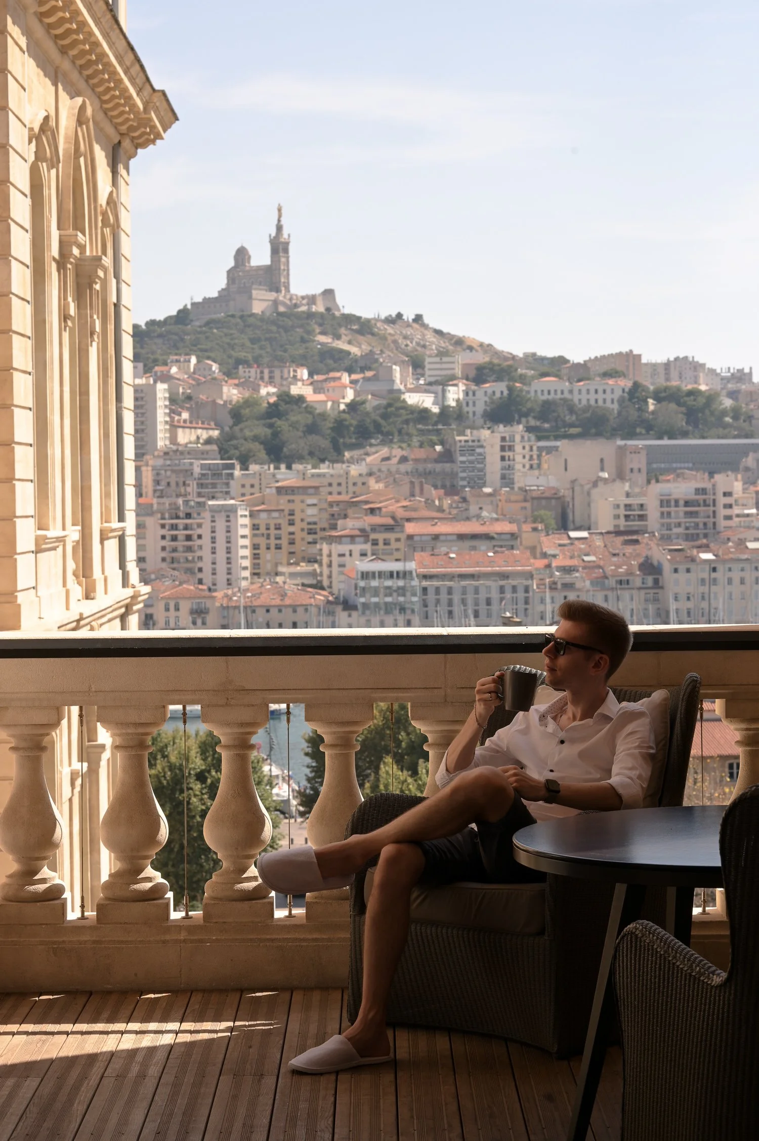Man on a terrace with a view