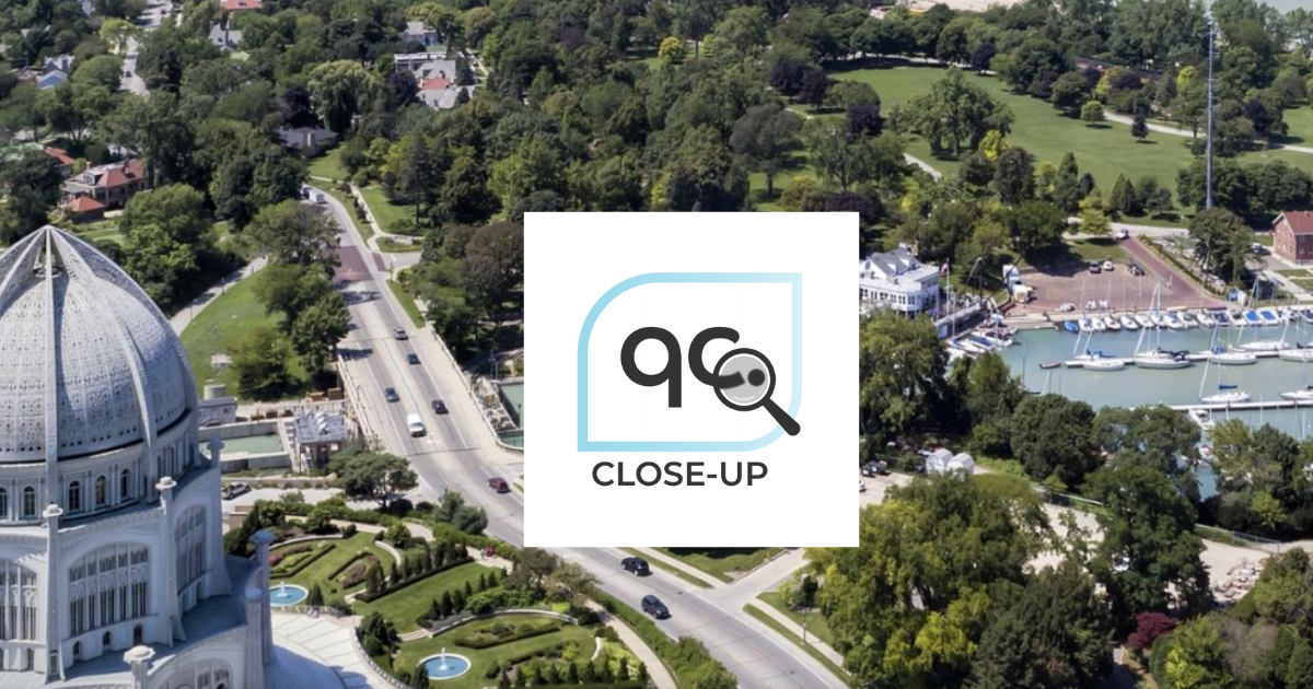 Two helicopters fly low over Brooklyn's skyline