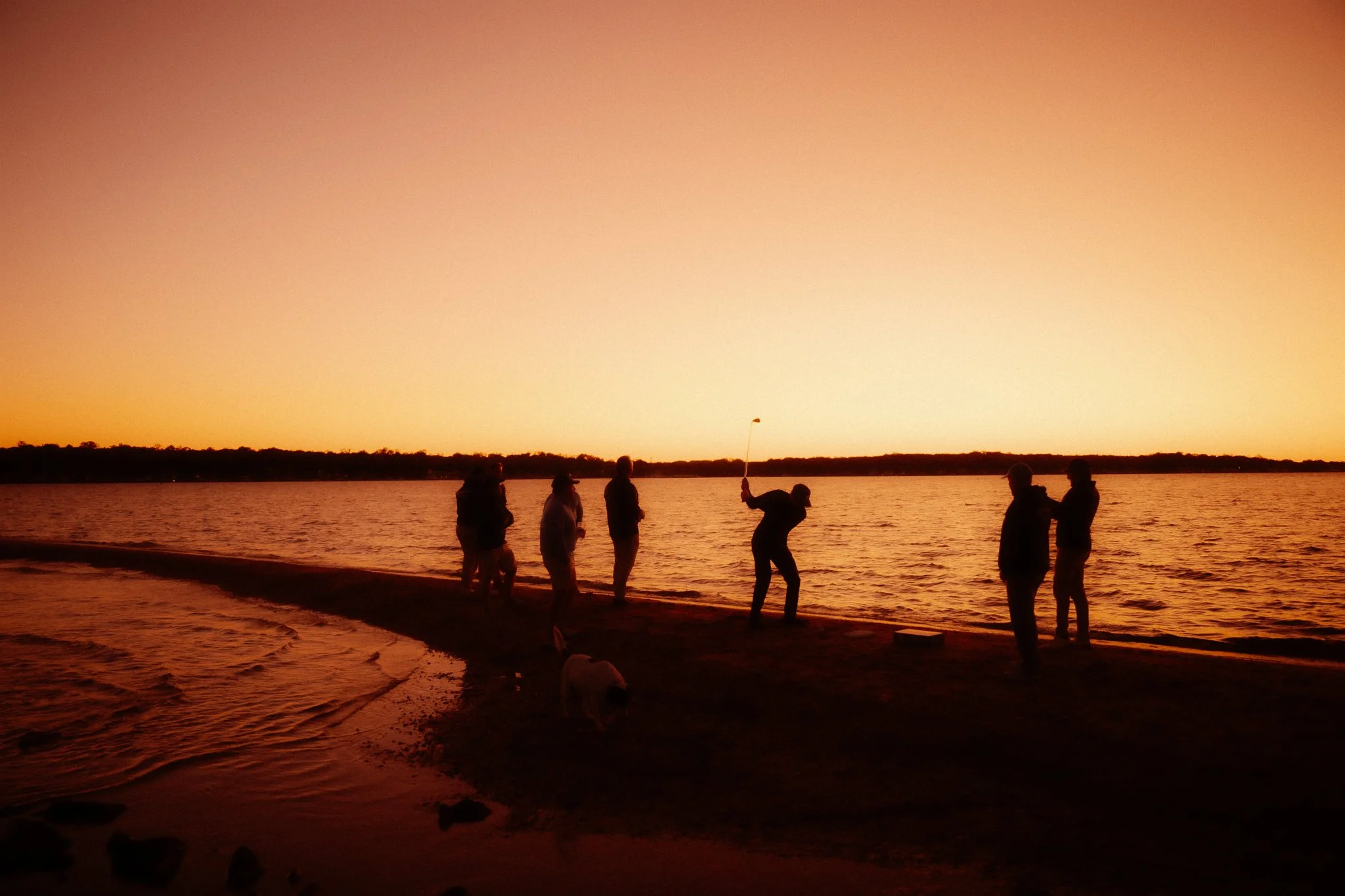 group hitting zero balls on the beach
