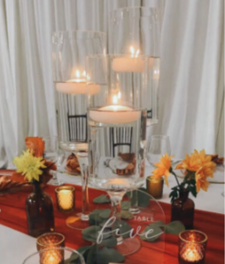 Set of Three Stemmed Vases - $35 per table
