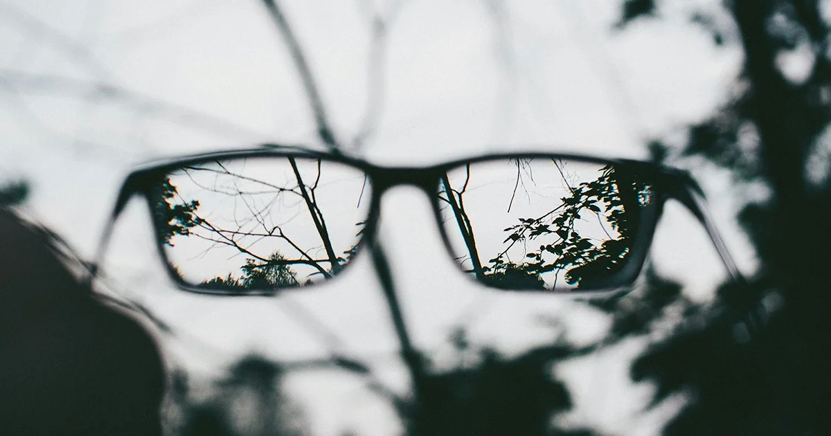 A pair of glasses to illustrate that charity branding is more than just about visibility.