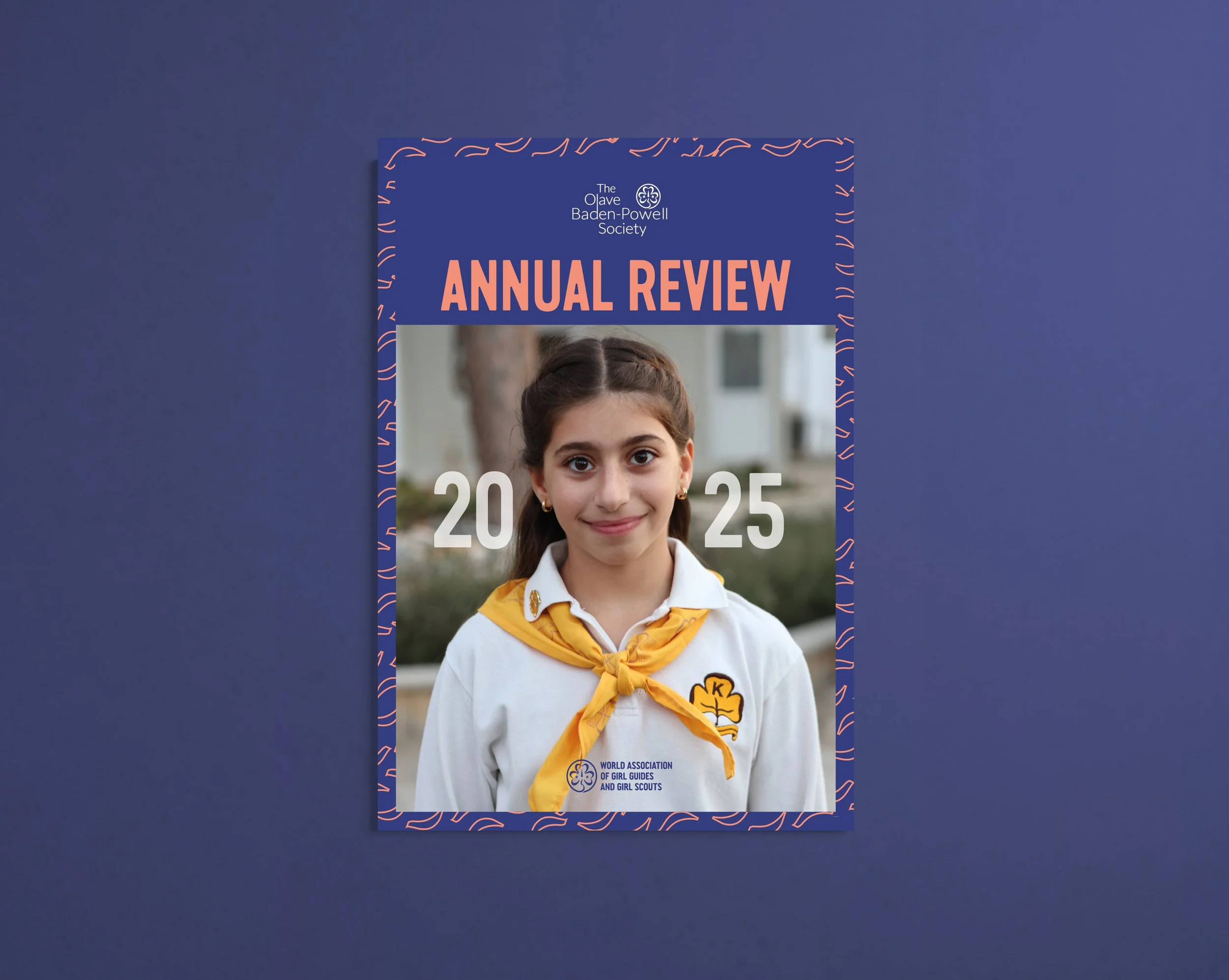 Annual Review cover design for the Olave Baden-Powell Society created by Sodium & Co.