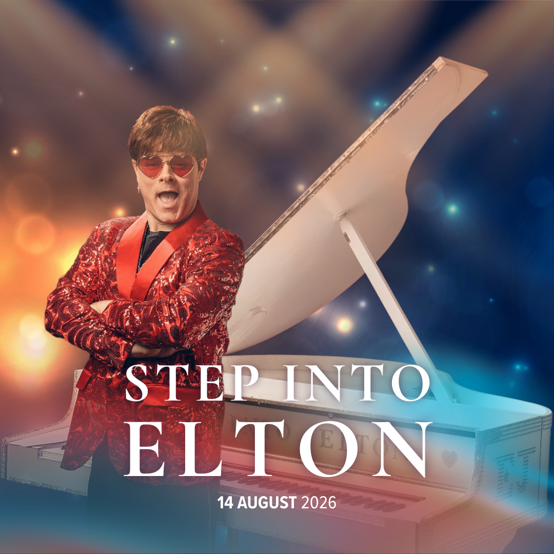 Promotional poster of Elvis Presley with a white grand piano, wearing red sunglasses and a shiny red jacket, with colorful bokeh background. Text reads "Step Into Elvis" and the date "14 August 2026."