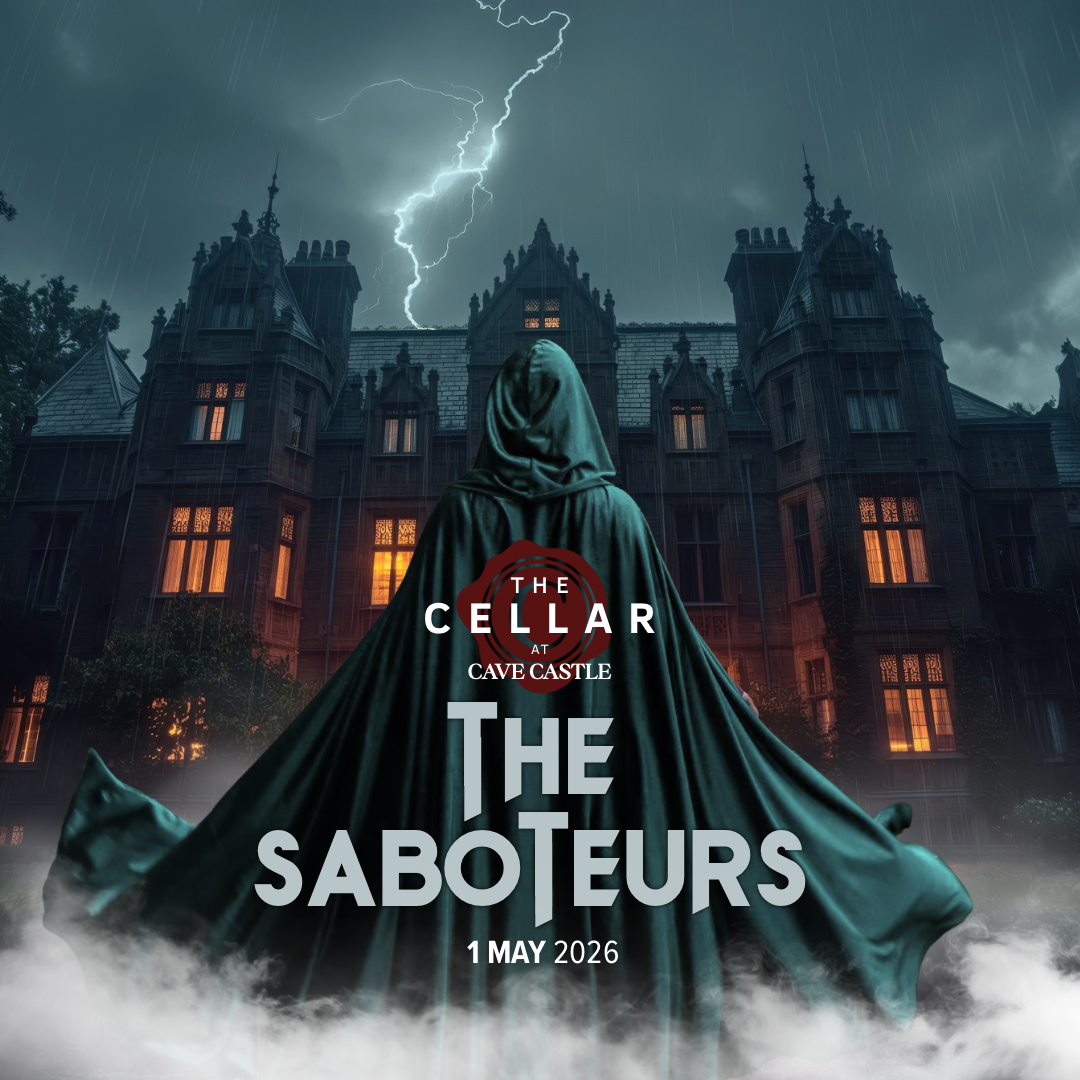A figure in a dark cloak stands in front of a gothic-style mansion during a storm with lightning. The image promotes the movie "The Cellar at Cave Castle: The Saboteurs," scheduled for May 1, 2026.