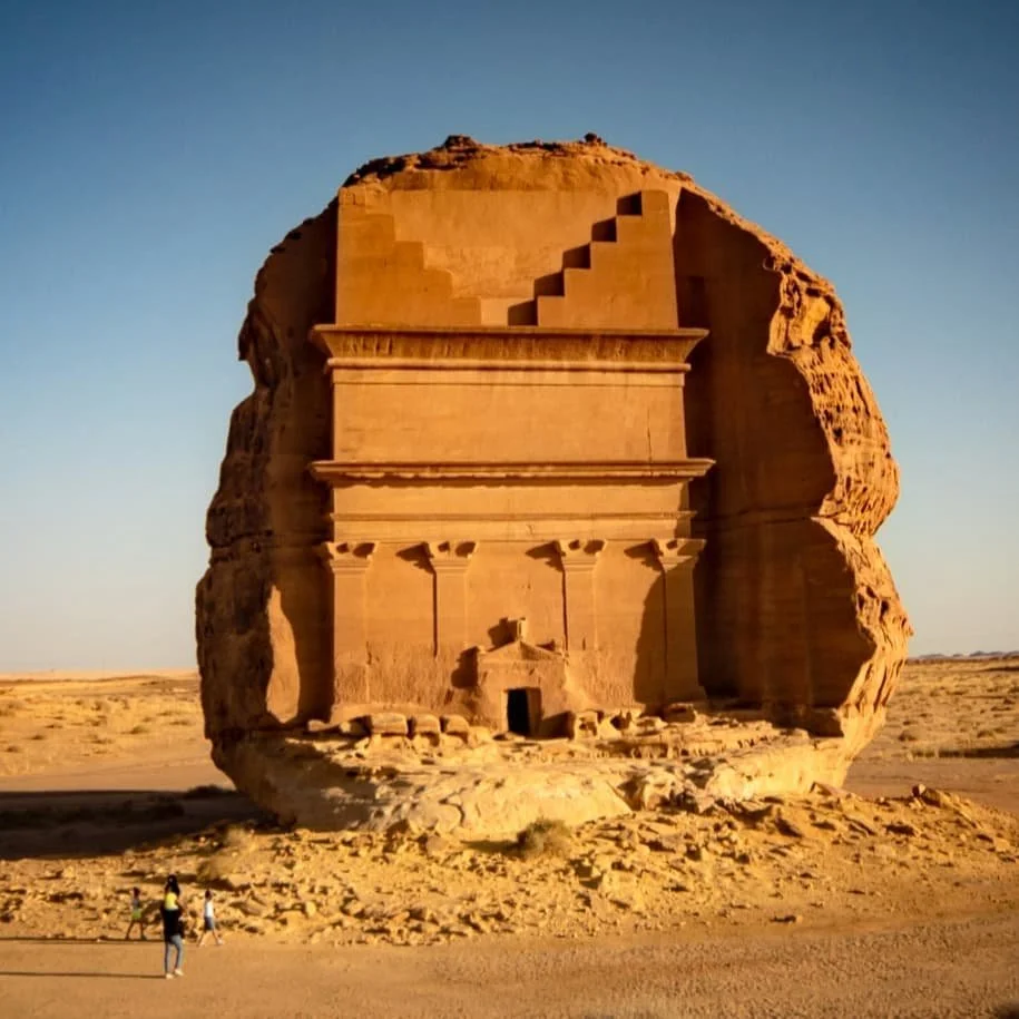 Standing at more than 4 stories high the incredible architectural design of the Qasr-al-Farid, is just one of Hegra's more than one hundred tombs which were carved into sandstone around 2000 years ago at the height of the Nabataean empire. 

This one