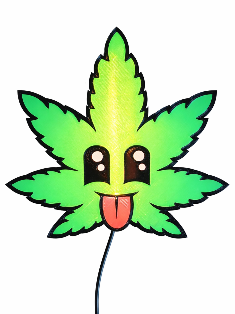 A neon sign shaped like a green marijuana leaf with cartoon facial features, including eyes, a nose, and a tongue sticking out.