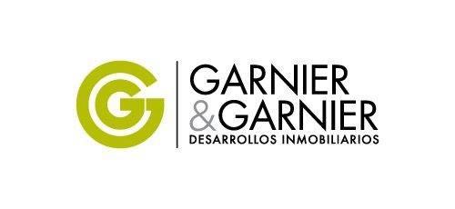 Logo of Garnier & Garnier Desarrollos Inmobiliarios with the initials G and a green circular design.