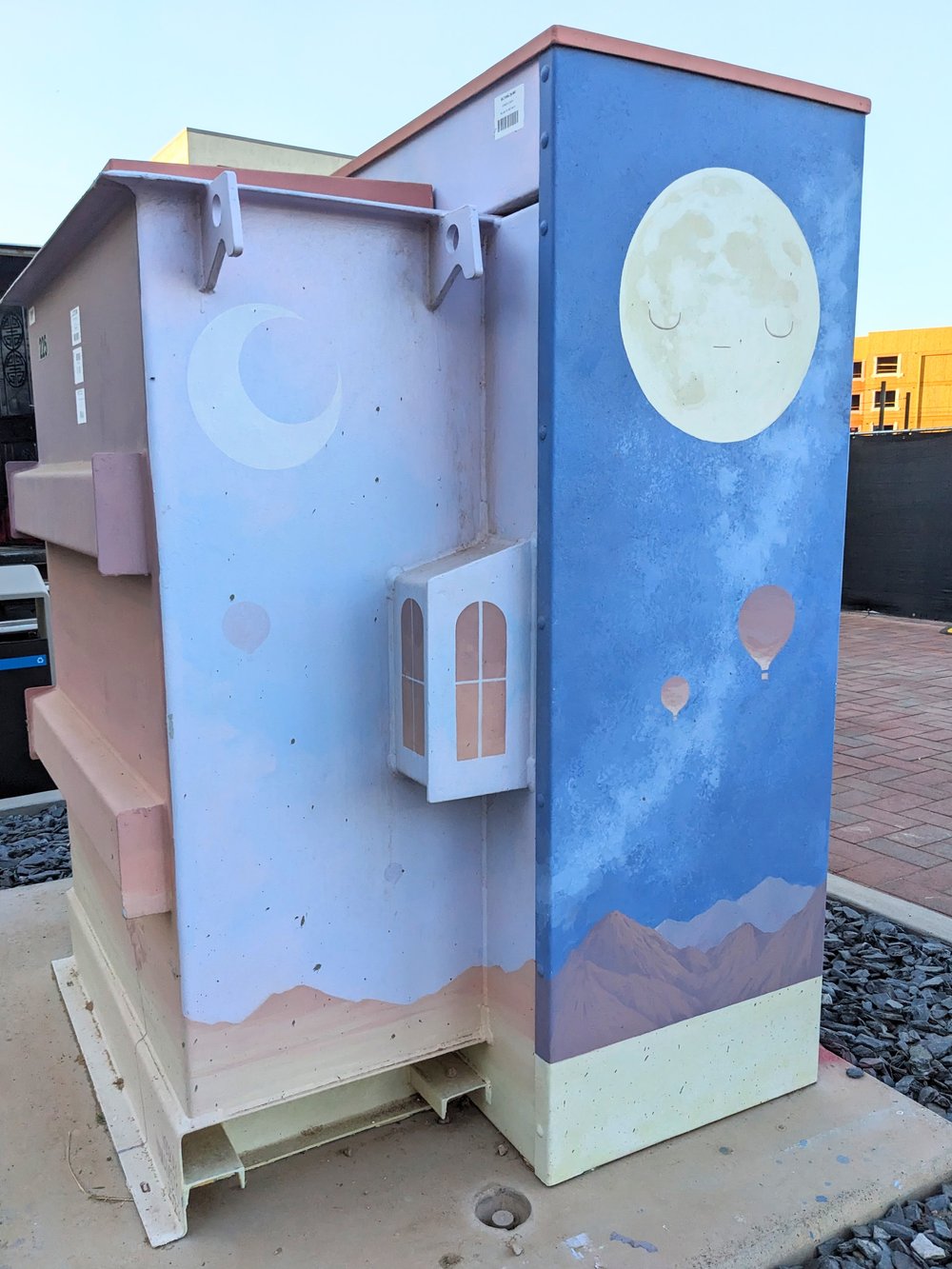 Whimsical murals by local artist on all of the utility boxes. :)