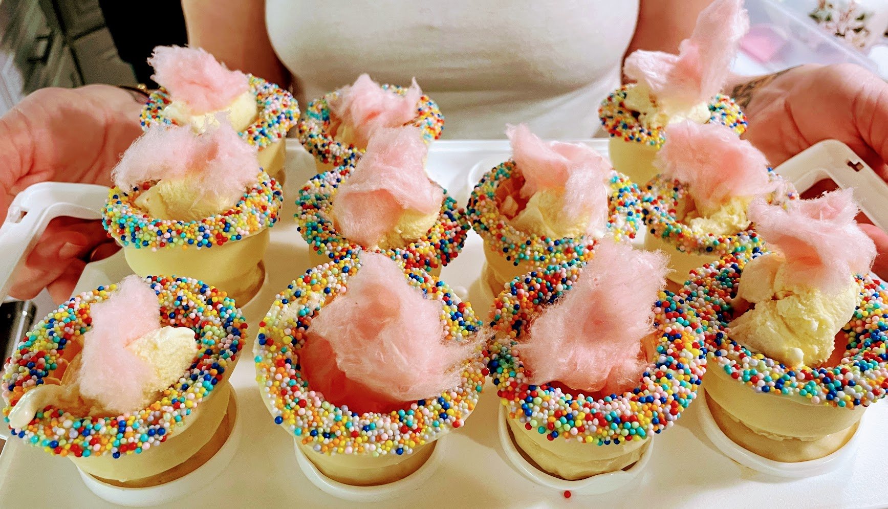 Edible tea cups billowing pink "steam"