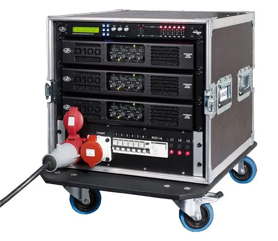 A portable electronic equipment rack on wheels with multiple audio or video signal processing units, power strips, and a power connection.