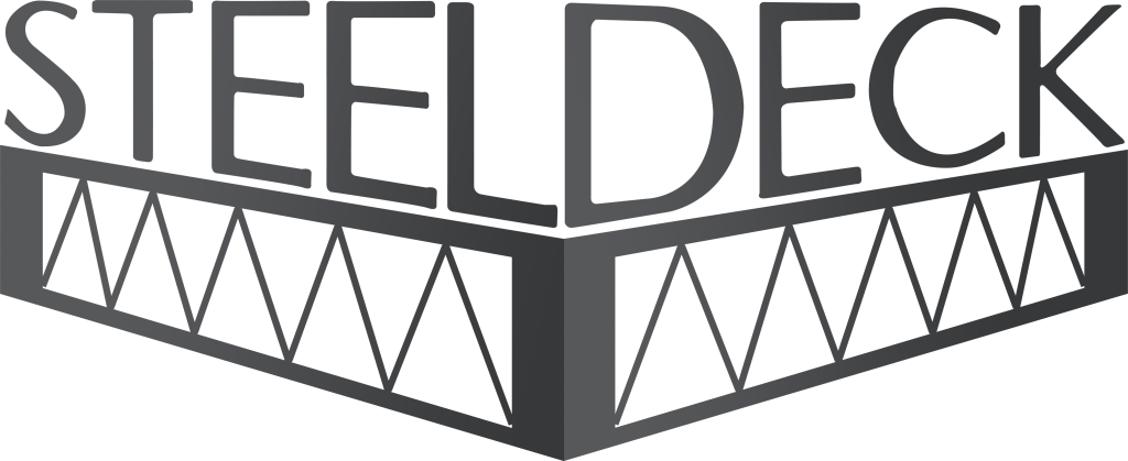 An outdoor skateboard park with multiple ramps and a person performing a stunt on a skateboard