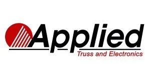 Logo for Applied Truss and Electronics, featuring a red circle with diagonal white lines and the company name in black text.