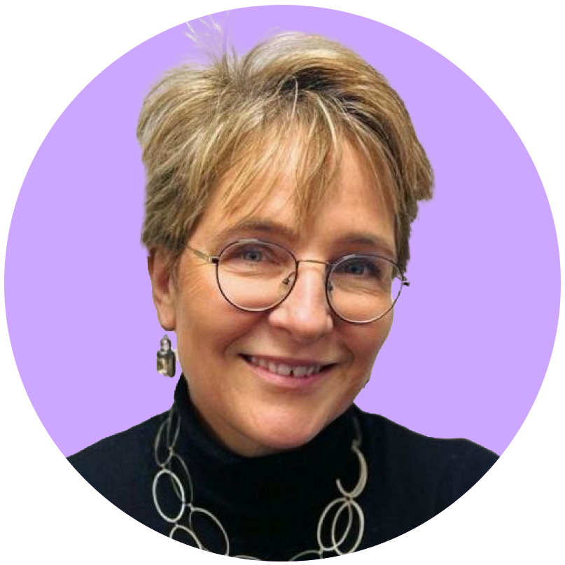 A woman with short blonde hair, glasses, and jewelry, smiling at the camera against a purple and black background.