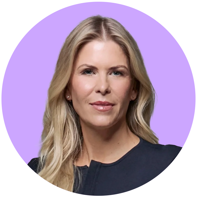 Portrait of a woman with blonde hair, wearing a black top, against a purple background with a partial black and purple geometric design.