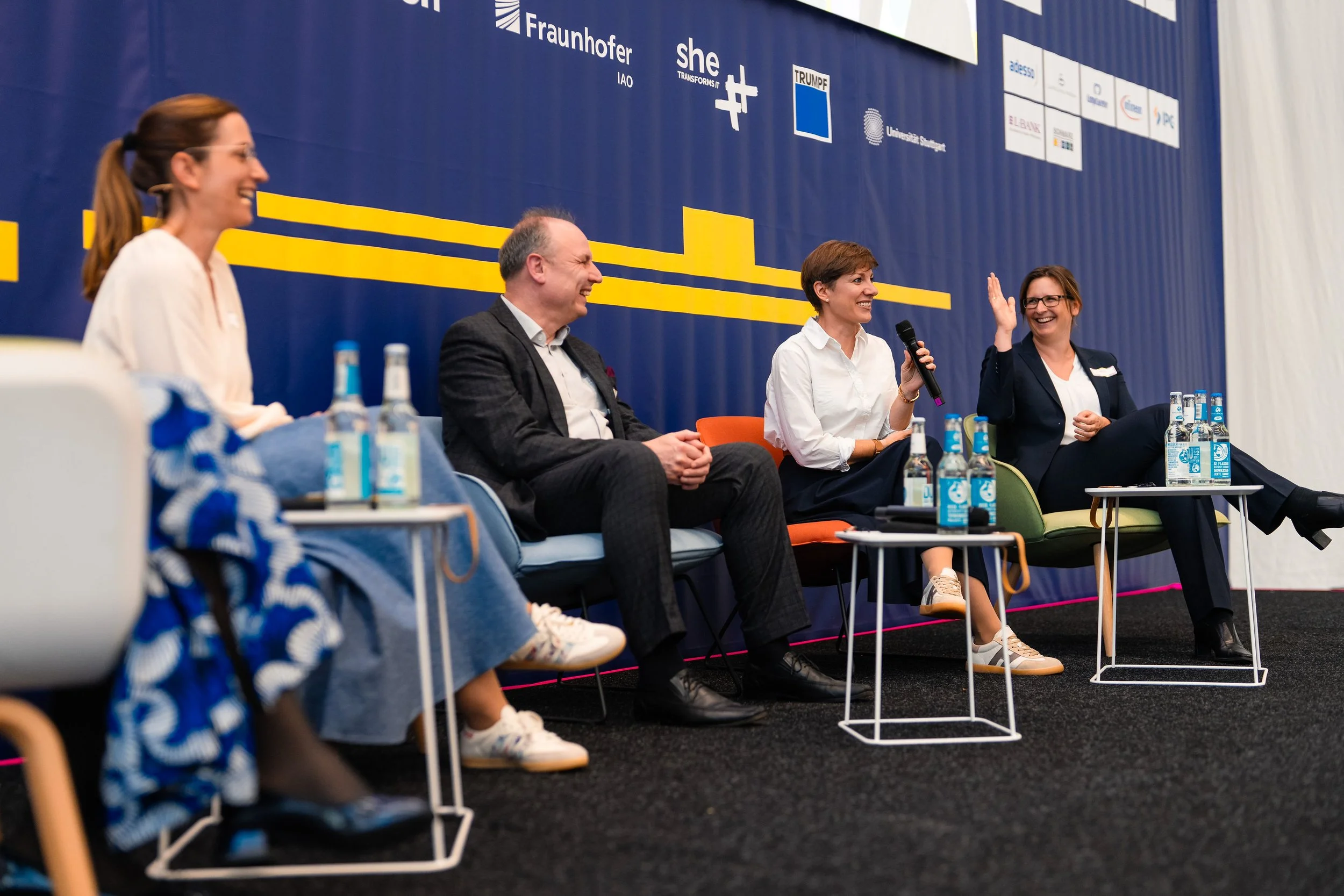 Panel „High Tech, High Performance" auf der Women of Tech Conference 2026 in Stuttgart mit Alexandra Wander, Isabell Gradert (Airbus) und Prof. Michael Weyrich (Universität Stuttgart).