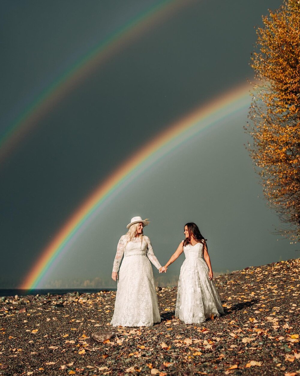 Stephanie and Maria had an absolutely epic and eventful Lake McDonald ceremony 🌈 Nature put on a full celebration of their love! 

Follow the link in our bio to read the story! 

Photographer: @jennifervernarskyphotography 
Celebrant: @lichenandpine