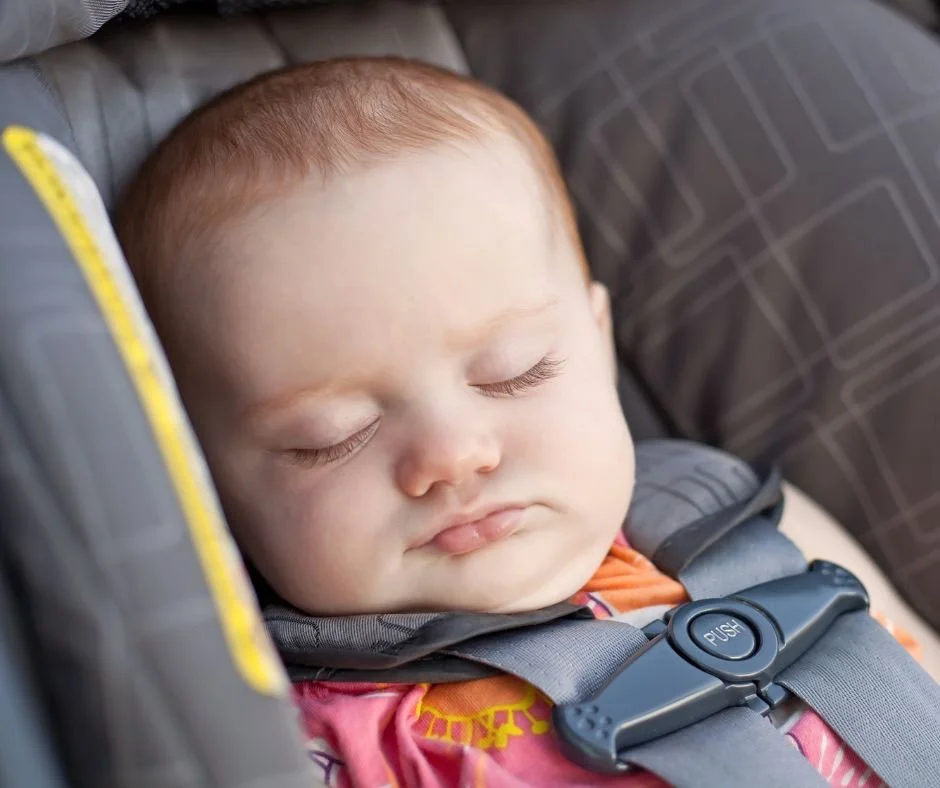 Baby sleeping in car seat