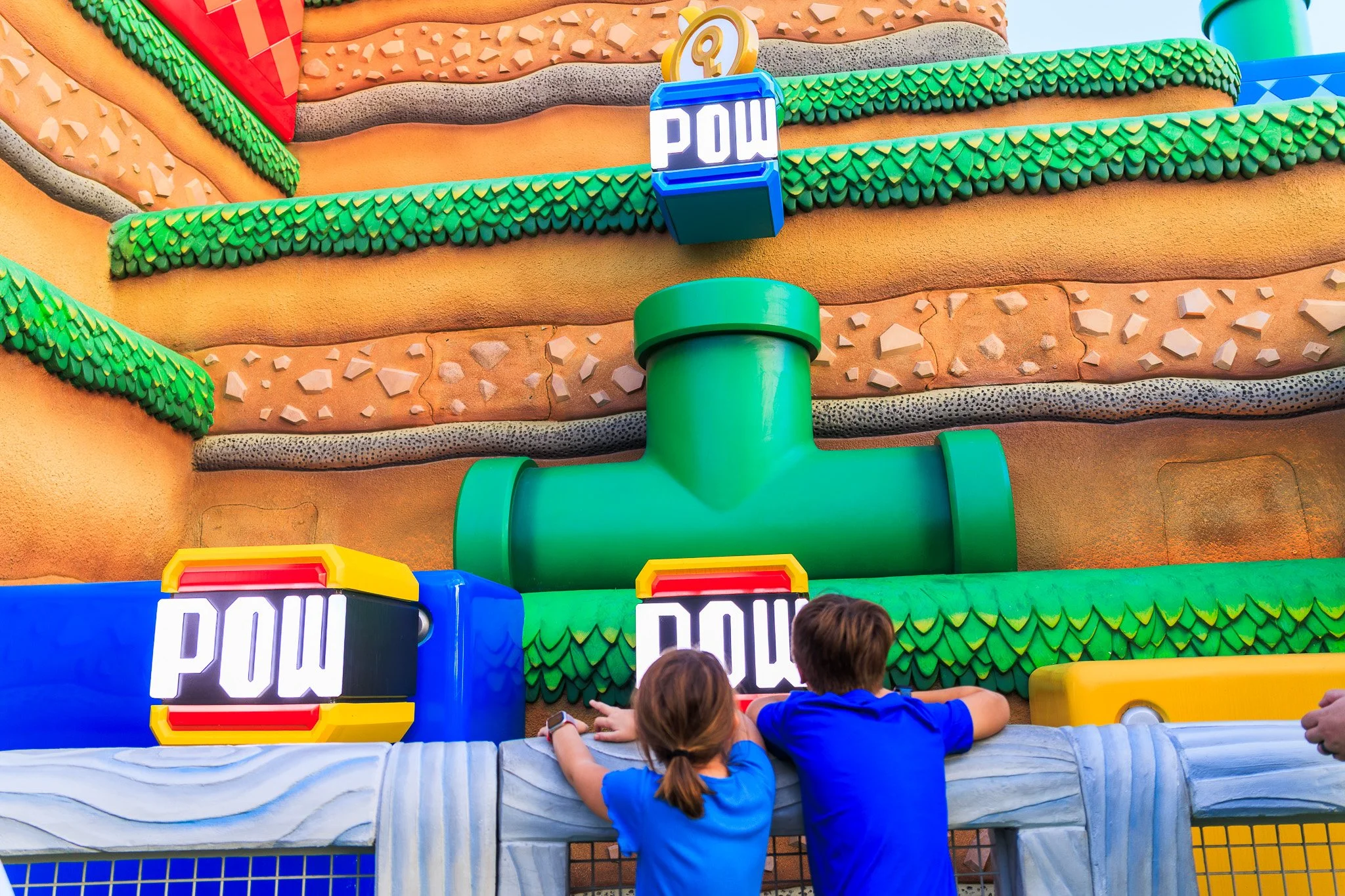 Tweens Playing Power Band Mario Game at Epic Universe.jpg