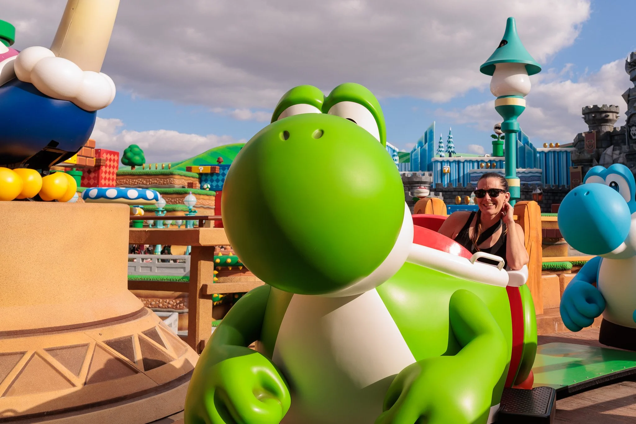 Woman Smiling Riding Yoshi's Adventure.jpg