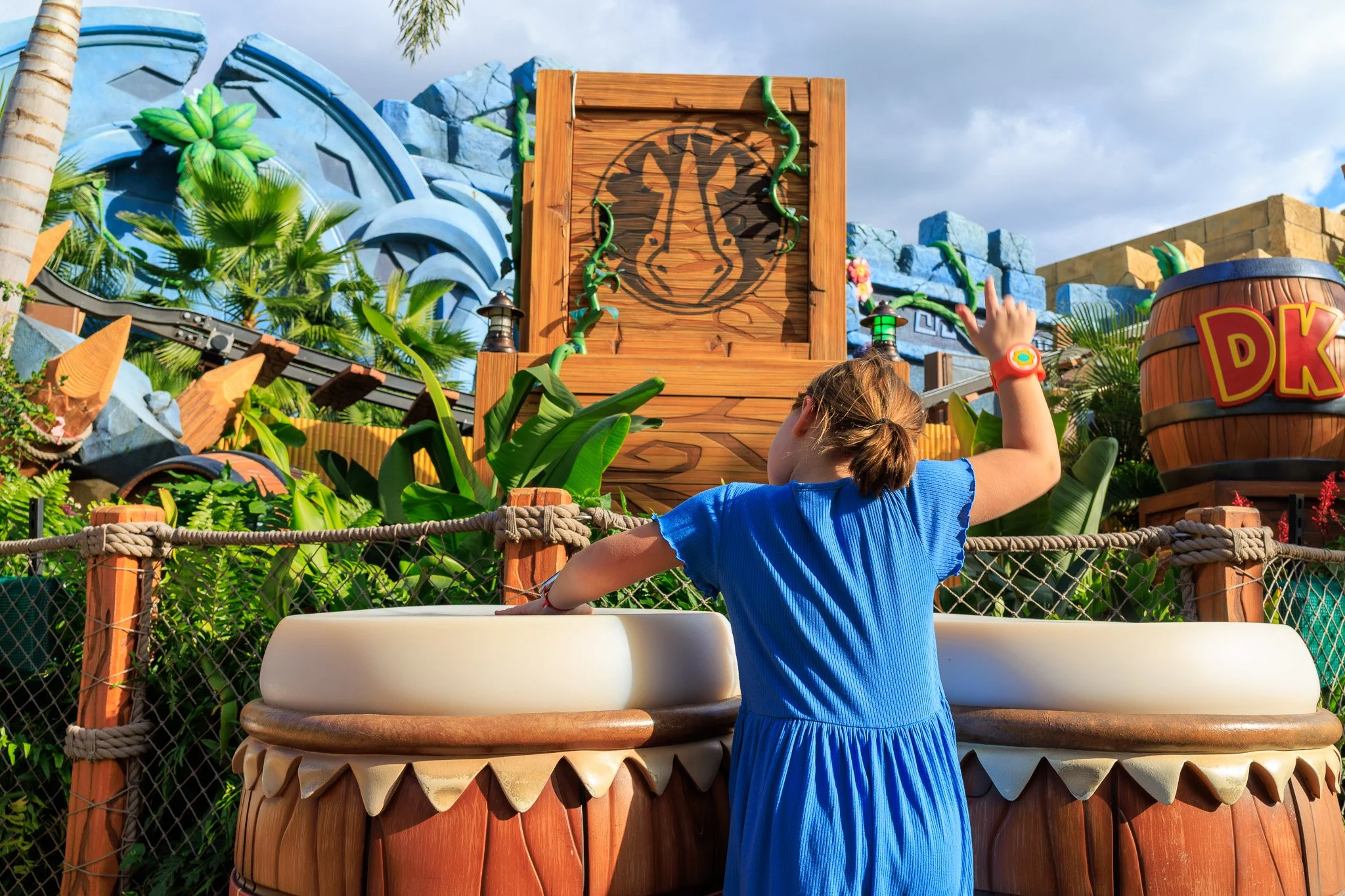 Tween Playing Drums at Donkey Kong Country Epic Universe.jpg