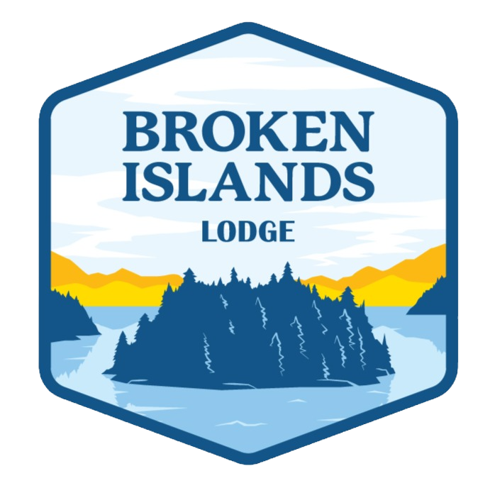 Logo for Broken Islands Lodge featuring a scenic landscape with islands, water, mountains, and trees, with blue, yellow, and white color scheme.