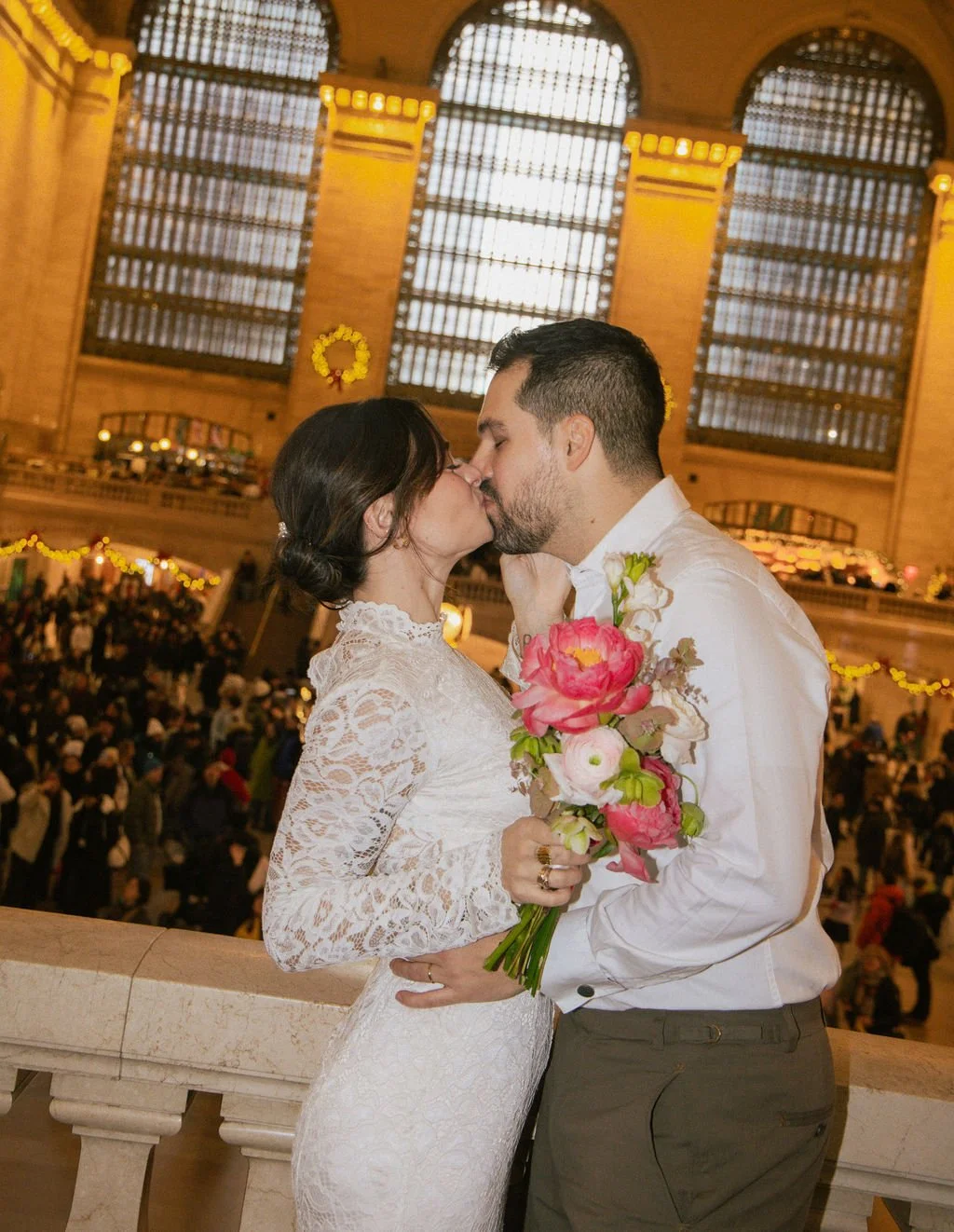 Couple kissing during their Housing Works Bookstore elopement in NYC, photographed by Cakewalk