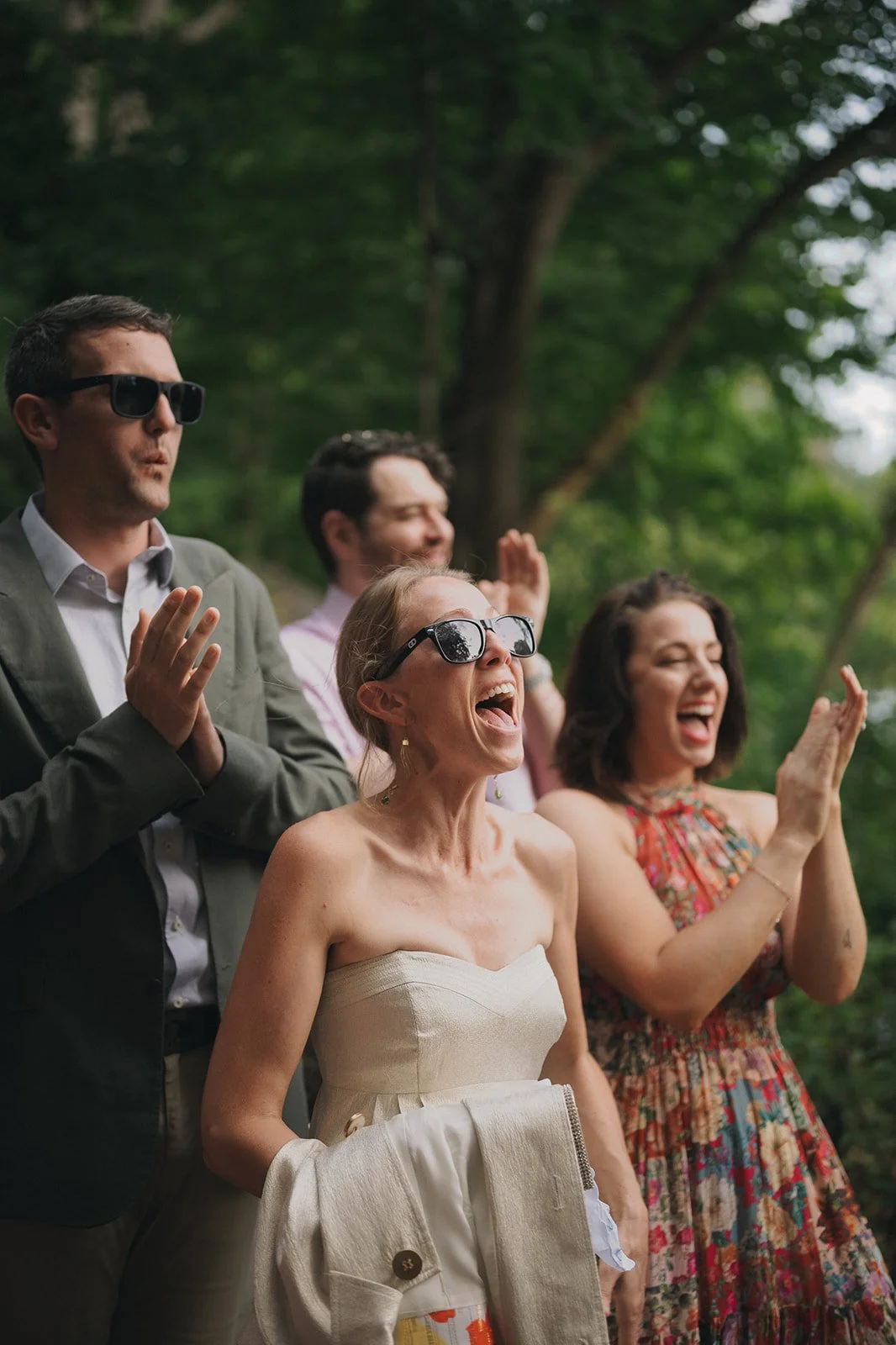 Friends celebrating after a Central Park elopement ceremony