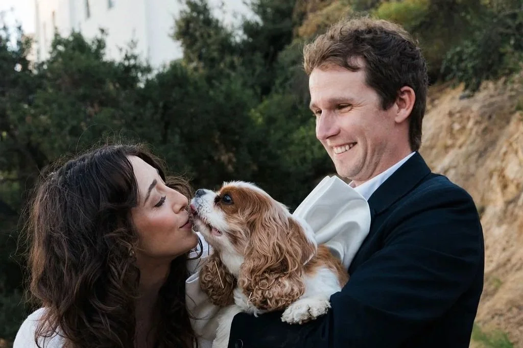 Newlyweds on a downtown LA sidewalk at sunset