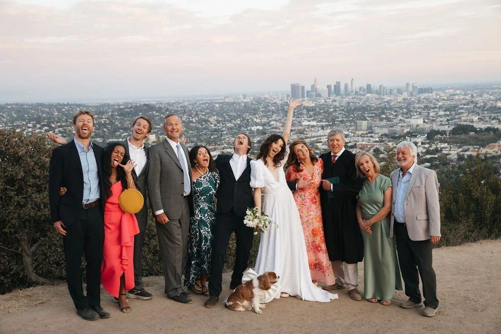 Family photos with the Los Angeles downtown skyline in the background, overlooking the LA basin.