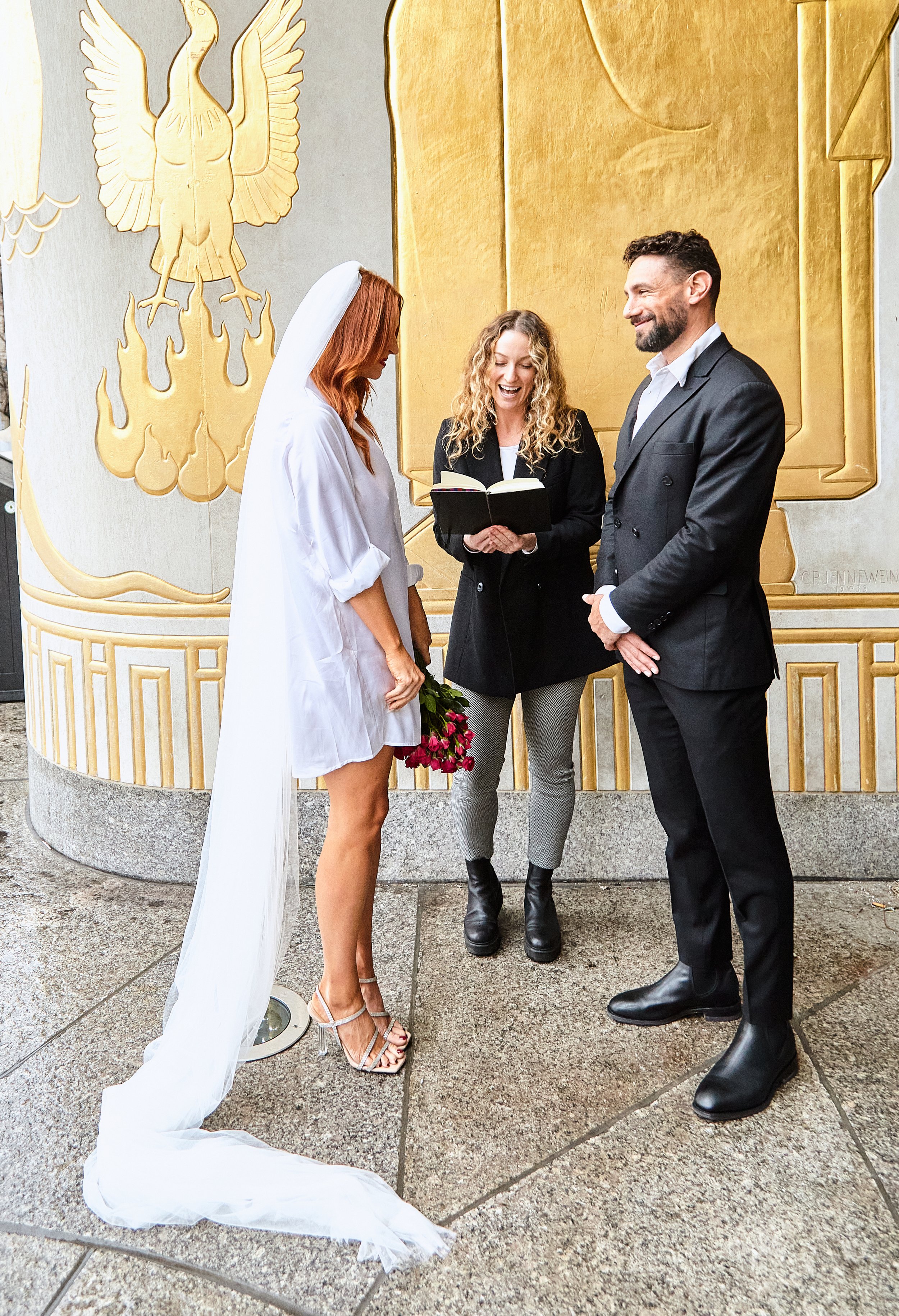 Bride and groom being married by Cakewalk officiant at Brooklyn Central Library.