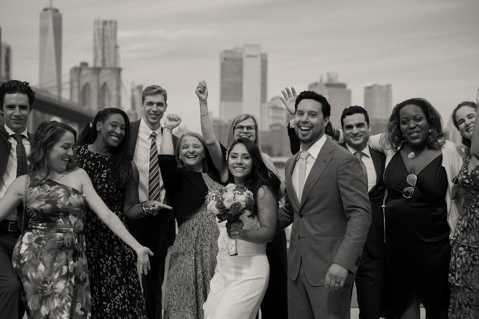 Wedding party celebrating outdoors after a small NYC elopement ceremony